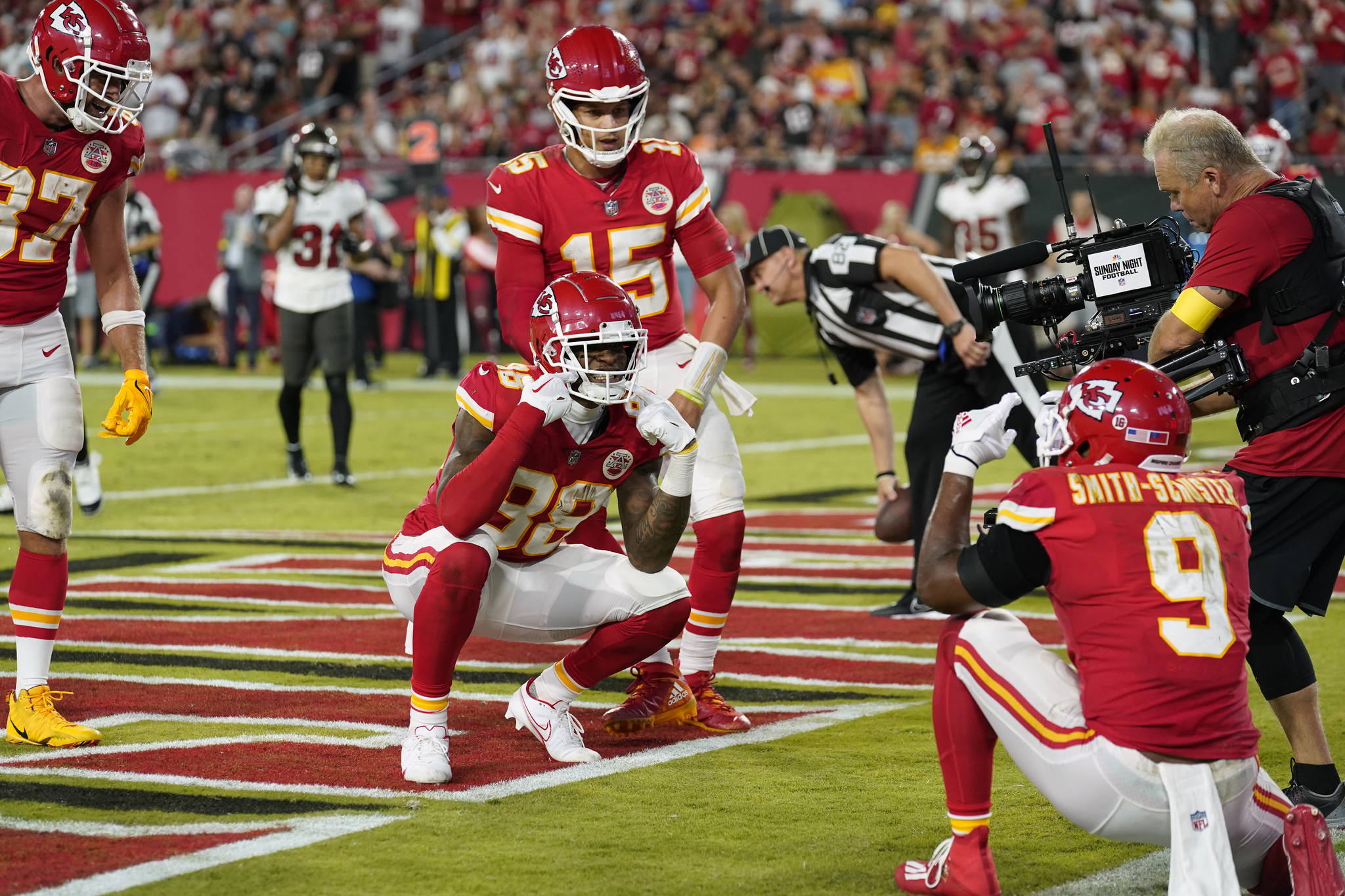 Kansas City Chiefs tight end Jody Fortson (88) and quarterback Patrick Mahomes (15) celebrate a touchdown with wide receiver JuJu Smith-Schuster (9)