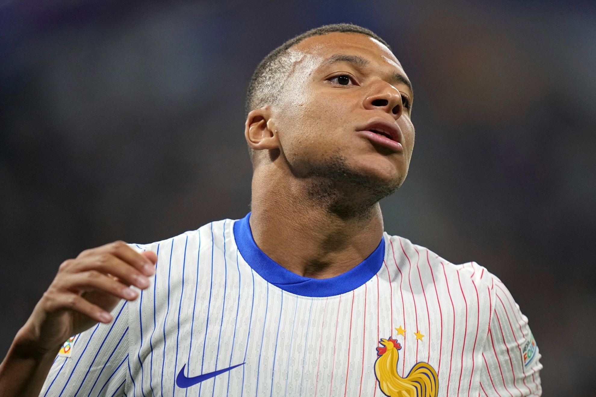 Frances Kylian Mbappe reacts during the UEFA Nations League soccer match between France and Belgium at the Groupama stadium in Decines, outside Lyon, France, Monday, Sept. 9, 2024. (AP Photo/Laurent Cipriani)