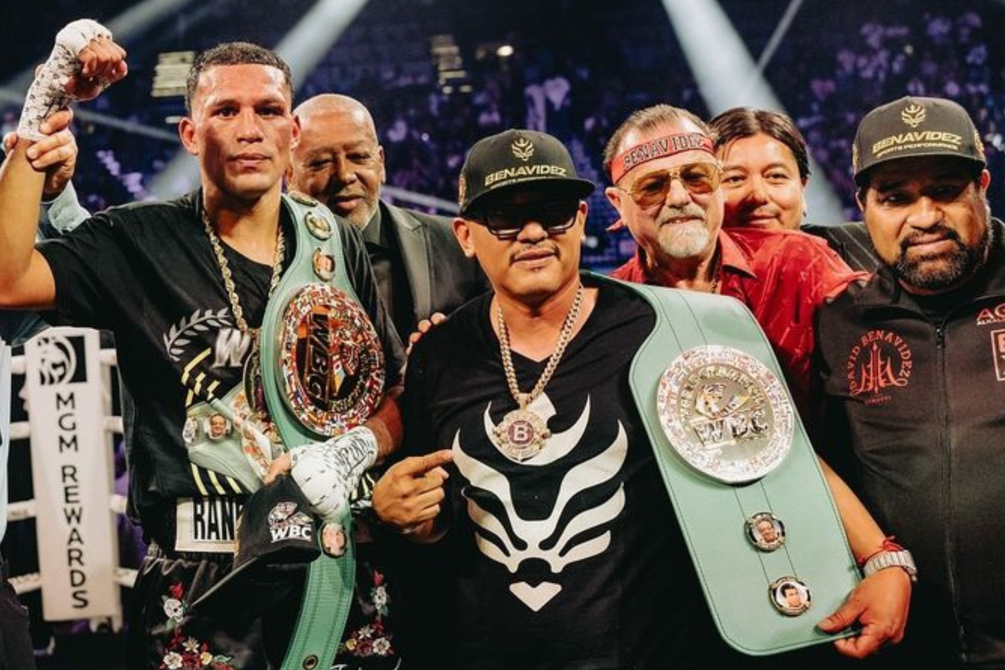 David Benavidez with his father and team after a win.