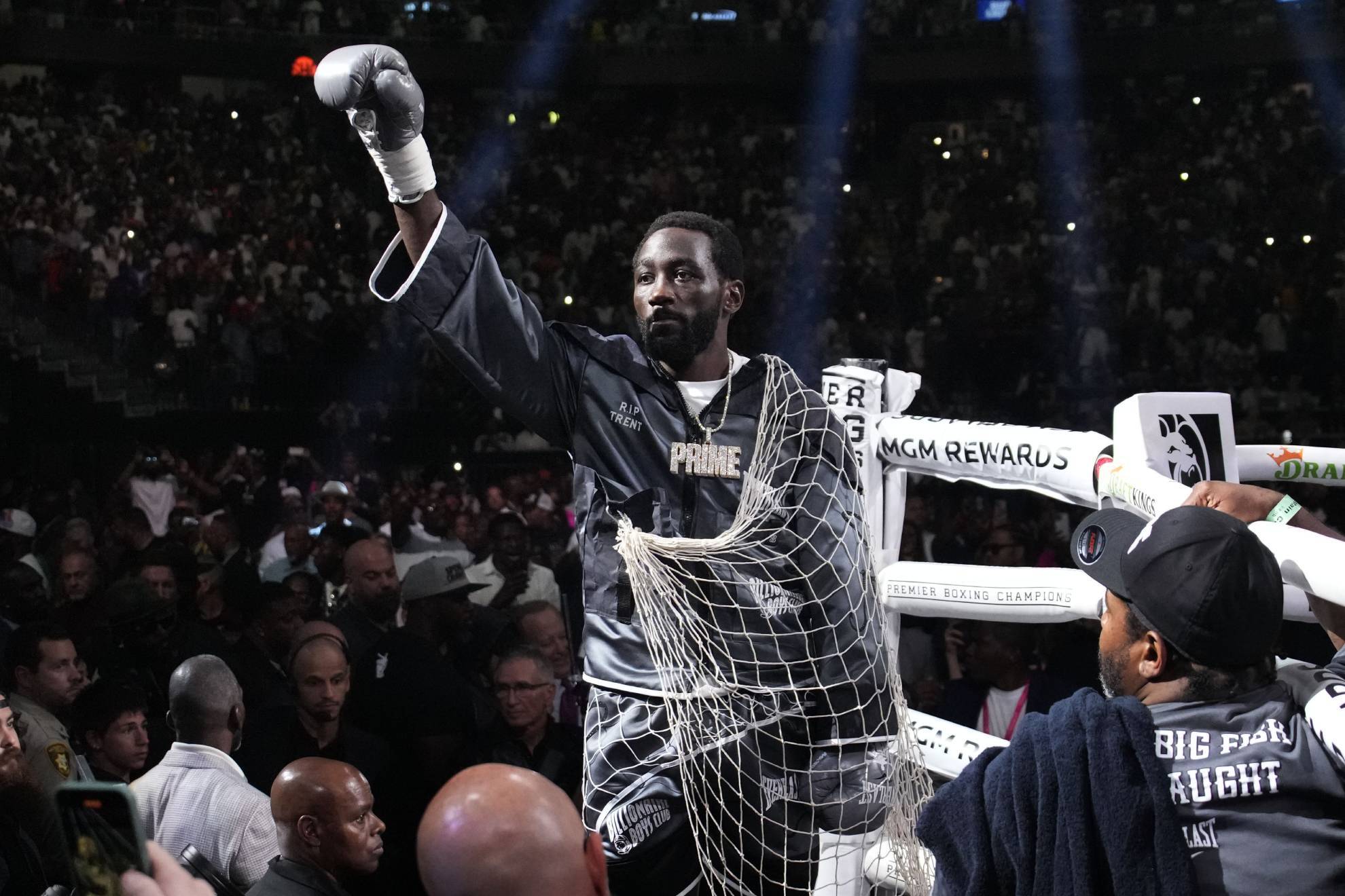 Terence Crawford motions while entering the ring before an undisputed welterweight championship boxing match against Errol Spence Jr., Saturday, July 29, 2023, in Las Vegas.