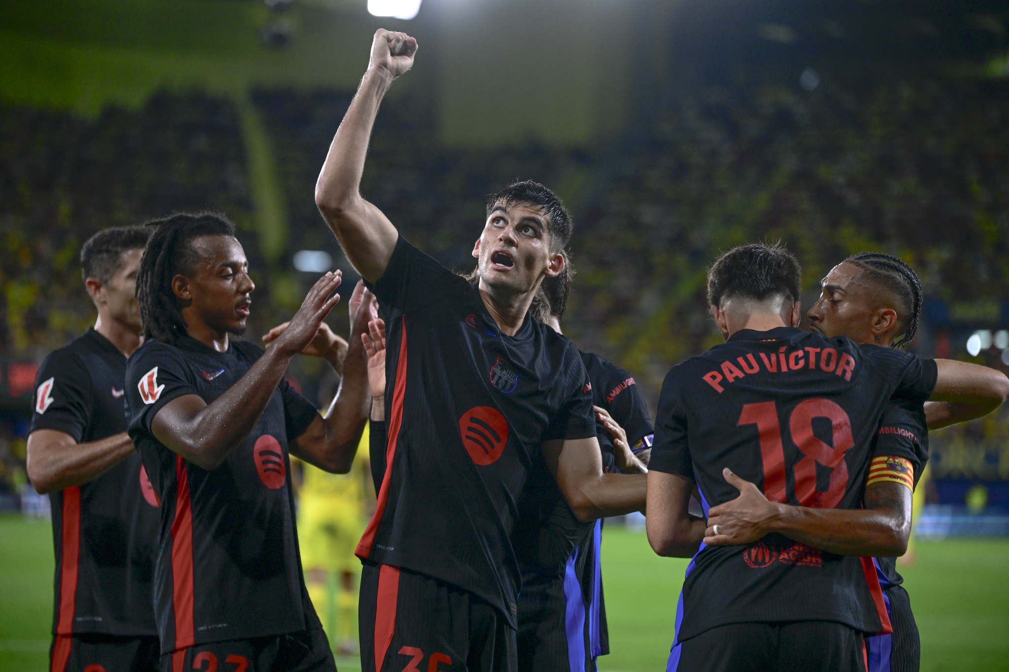 Barcelona players celebrate fourth goal