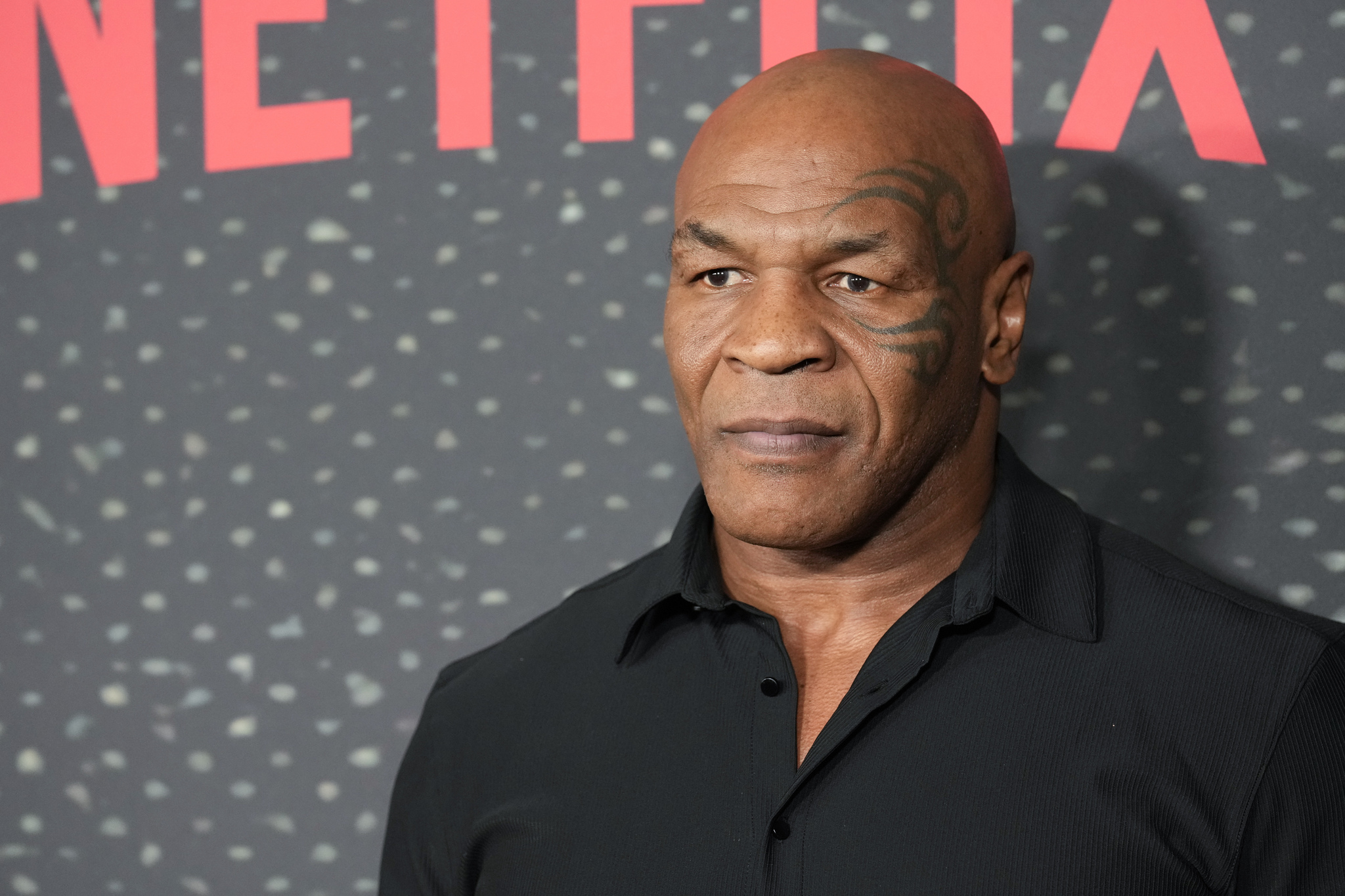 Video of Mike Tyson terrifying a fan with a sudden dramatic mood shift at the airport goes viral