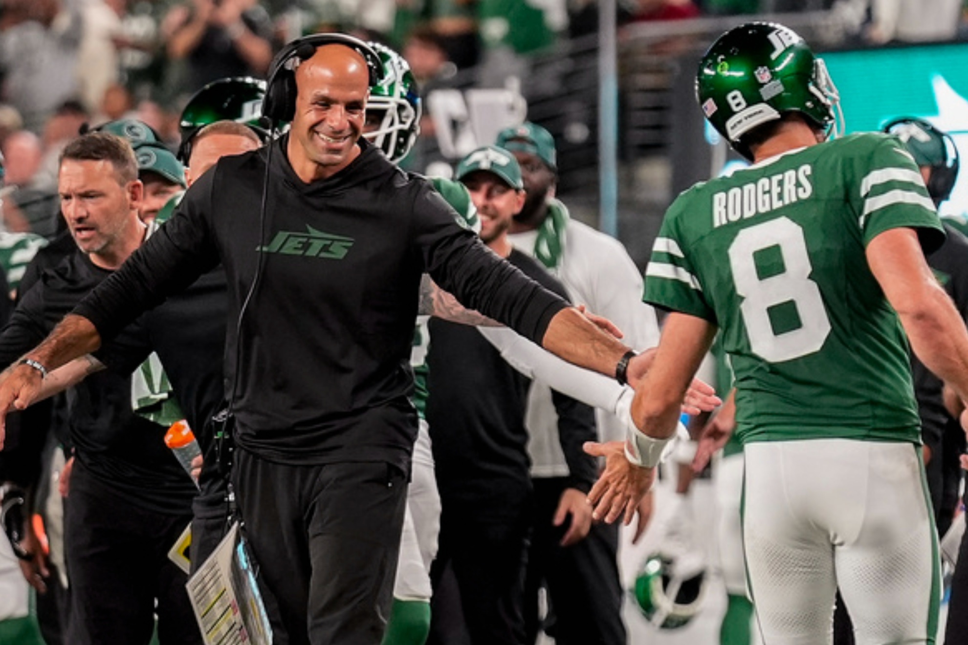 Robert Saleh and Aaron Rodgers during a regular season game against the New England Patriots