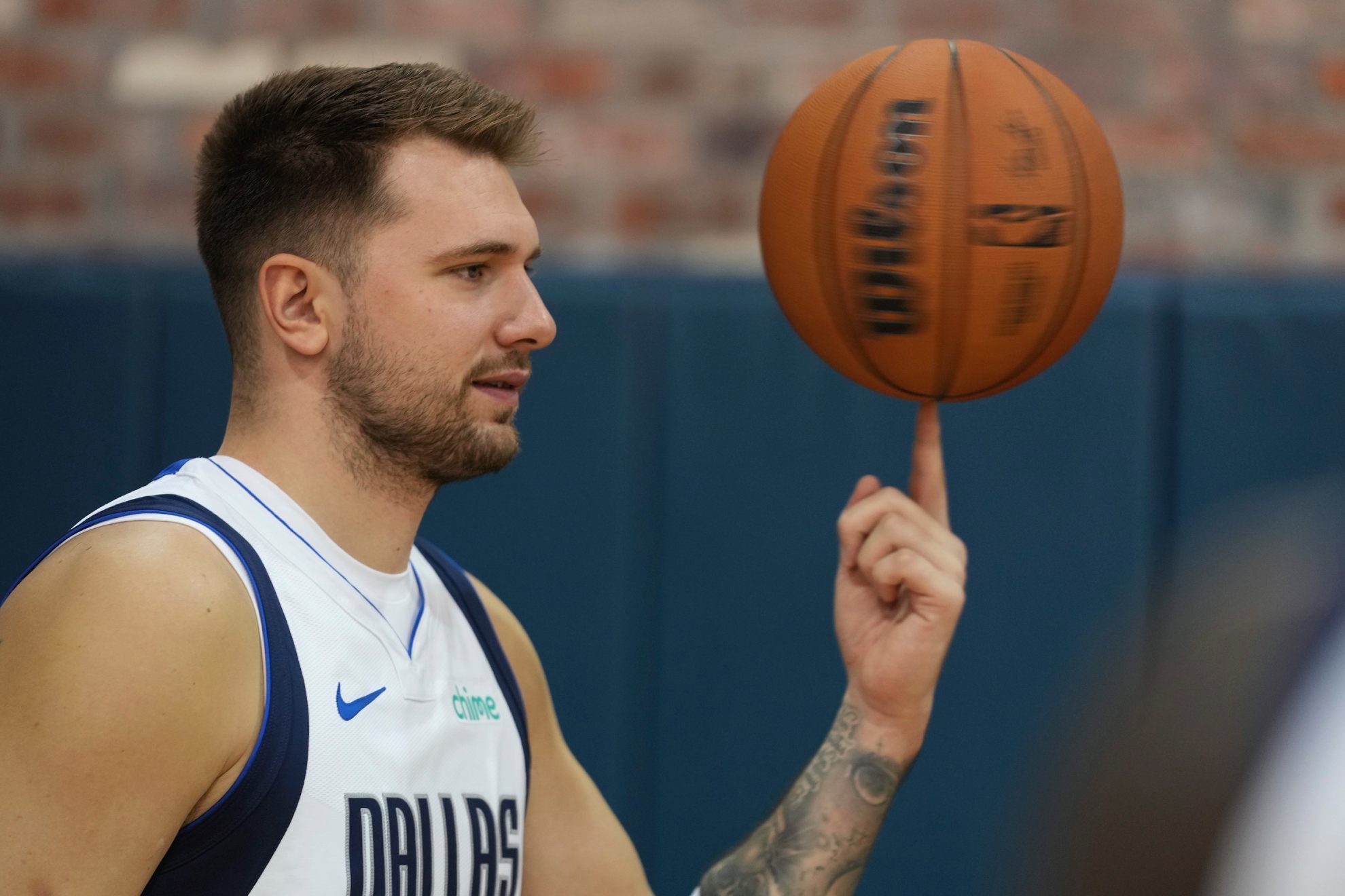 Luka Doncic poses for a photo during the NBA basketball teams media day /