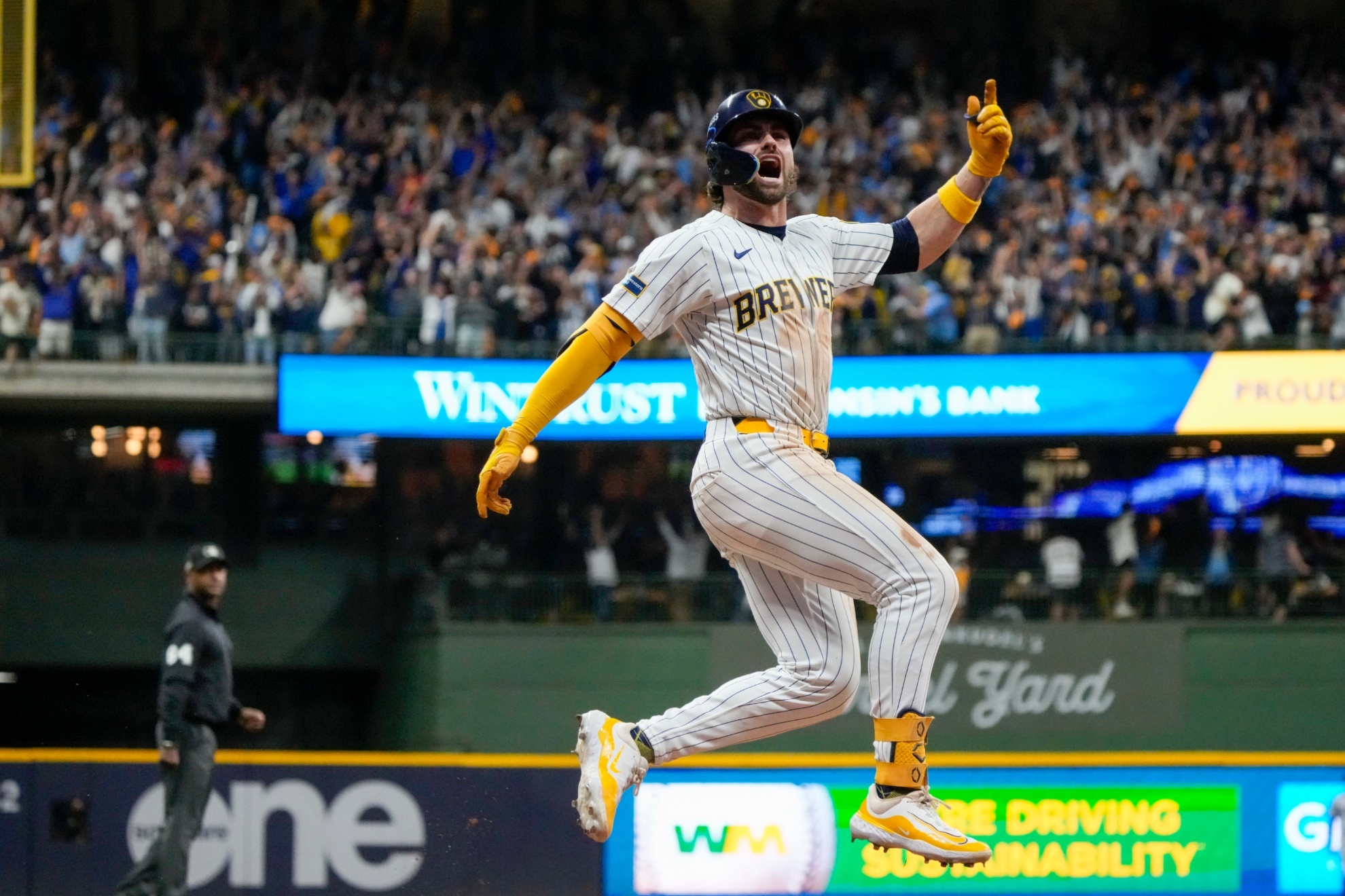 Milwaukee Brewers Garrett Mitchell celebrates afrer hitting a two-run home run during the eighth inning of Game 2 of a National League wild card baseball game against the New York Mets Wednesday, Oct. 2, 2024, in Milwaukee. (AP Photo/Morry Gash)