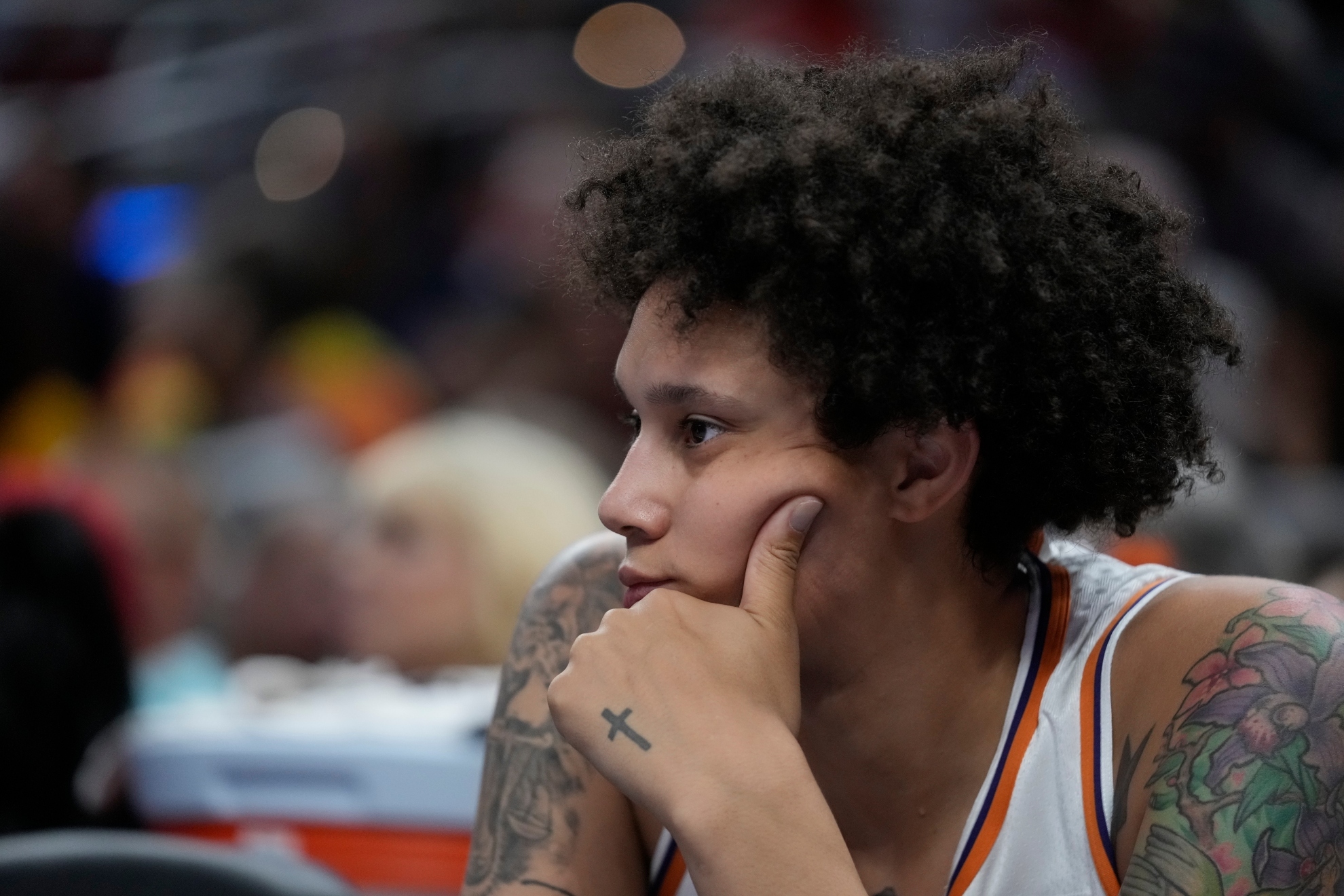 Phoenix Mercurys Brittney Griner watches during the first half of a WNBA basketball game Indiana Fever, Friday, Aug. 16, 2024, in Indianapolis. (AP Photo/Darron Cummings)