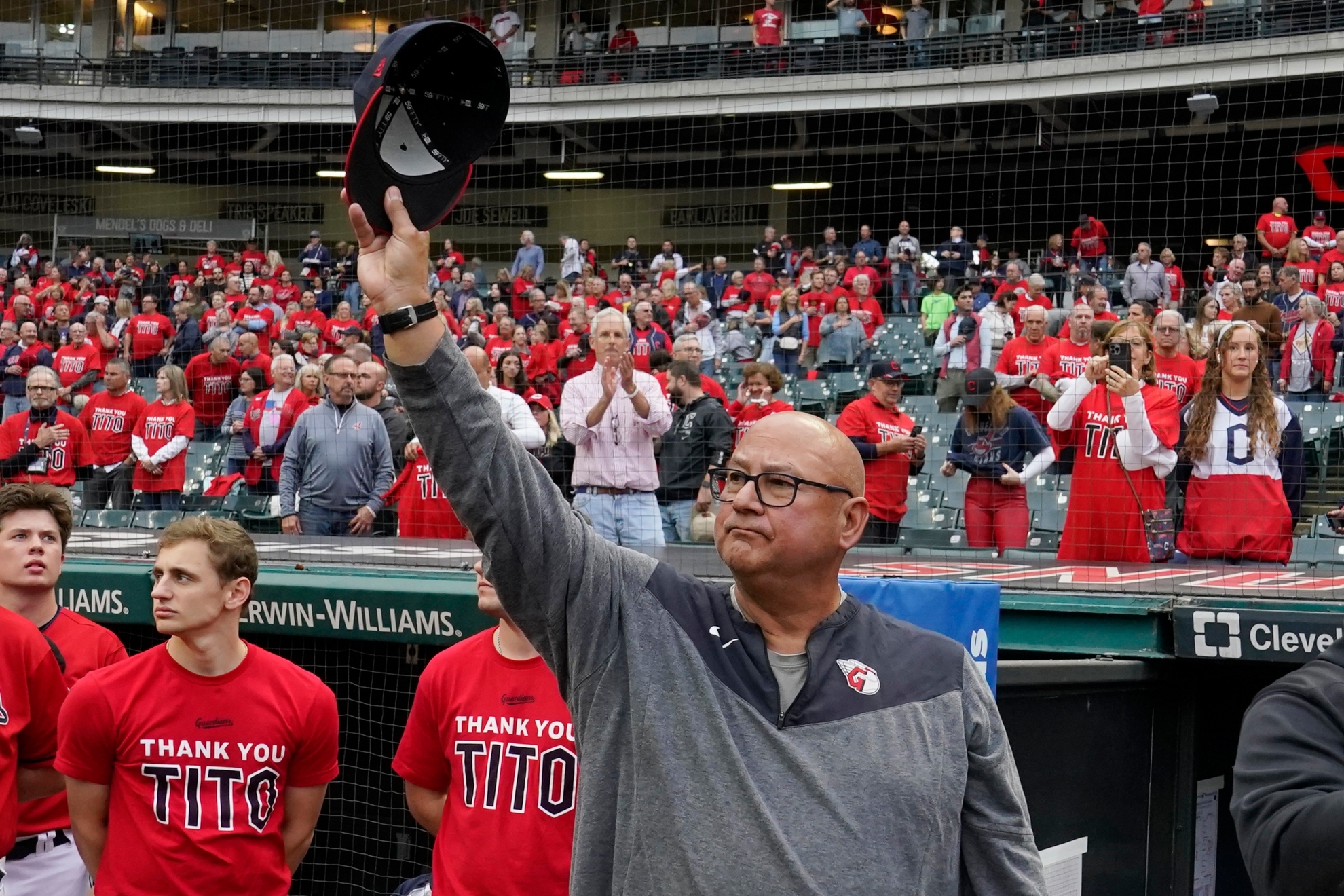 Cleveland Guardians manager Terry Francona waves to the band before the playing of the national anthem for the teams baseball game against the Cincinnati Reds, Wednesday, Sept. 27, 2023, in Cleveland. (AP Photo/Sue Ogrocki)