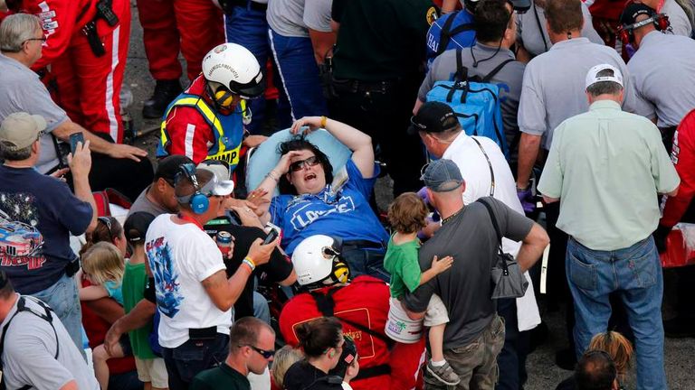 Rescue workers attend to the injured