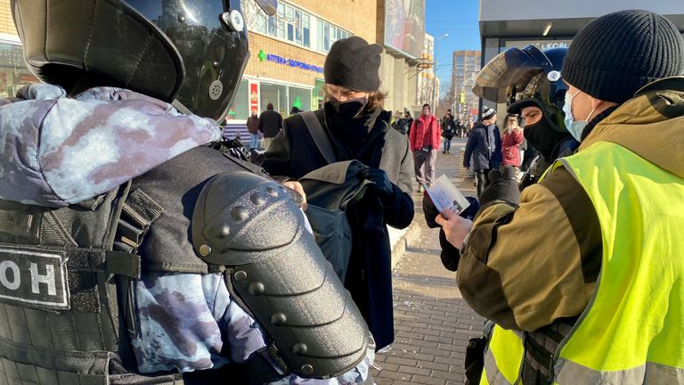 Police checking the documents belonging to people near the Moscow city court