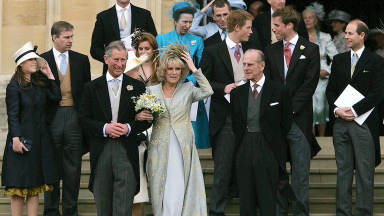 Britain's Prince Charles, and his bride Camilla  Duchess of Cornwall, at front centre, with the Duke of Edinburgh, front right, with other members of the Royal Family as they  leave St George's Chapel in Windsor, England following the church blessing of their civil wedding ceremony, Saturday, April 9, 2005. The members of the Royal Family  standing behind Prince Charles and the Duchess are from left, Princess Eugenie, Prince Andrew, Princess Beatrice, Princess Anne, Peter Phillips. Prince Harry,