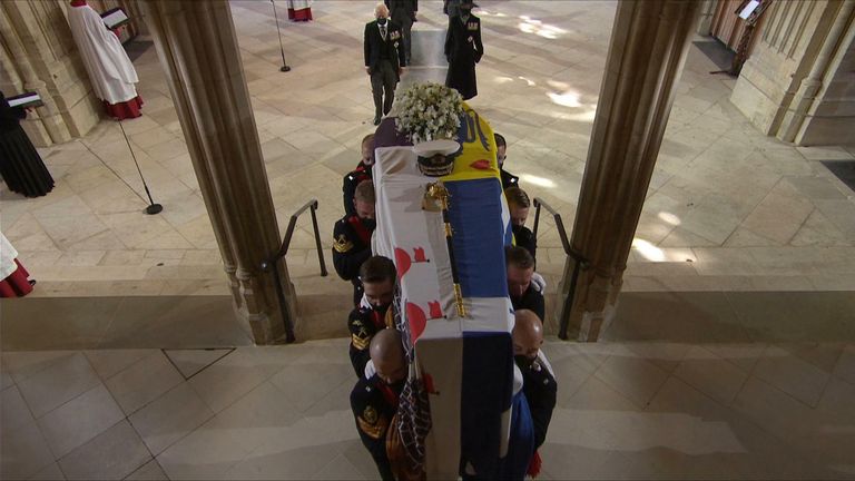 The coffin is carried through the chapel at the start of the Duke of Edinburgh&#39;s funeral.