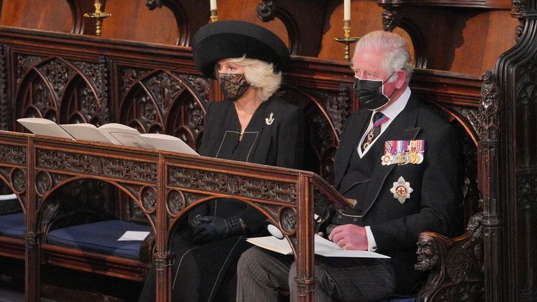 The Duchess of Cornwall and the Prince of Wales during the Duke of Edinburgh's funeral at St George's Chapel, in Windsor Castle, Berkshire. Picture date: Saturday April 17, 2021.