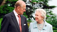 Britain's Queen Elizabeth and Prince Philip, the Duke of Edinburgh walk at Broadlands in Romsey, southern England in this undated photograph taken in 2007. The Queen and Prince Philip will mark their diamond wedding anniversary with a special service of thanksgiving on November 19, 2007. REUTERS/Fiona Hanson/Pool (BRITAIN - Tags: SOCIETY ROYALS)
