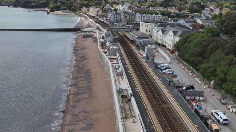 The new Dawlish station and the sea wall protecting the Dawlish rail route