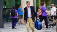 Vice Admiral Sir Tim Laurence leaves Southmead Hospital in Bristol. Pic: PA 


