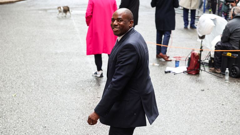 David Lammy walks outside Downing Street.
Pic: Reuters