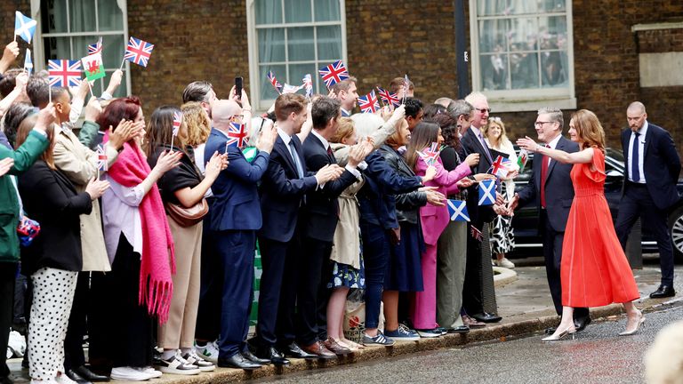 Keir Starmer and Victoria arrive at Number 10 Downing Street.
Pic: Reuters