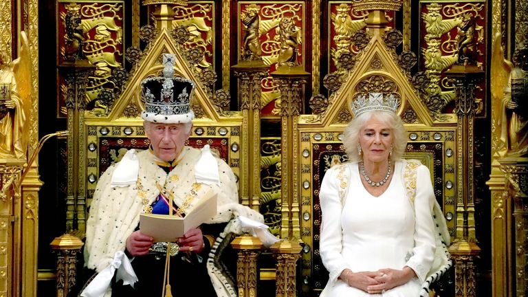 King Charles reads the King's Speech, as Queen Camilla sits beside him during the State Opening of Parliament.
Pic: Reuters