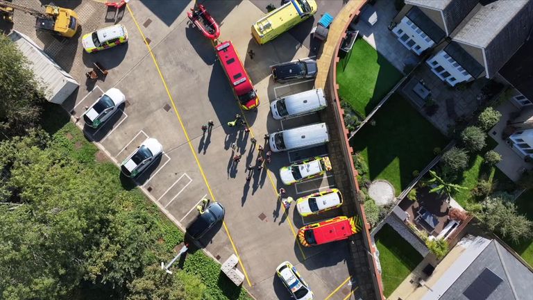 A small boat believed to be carrying six people on the River Thames in Surrey has capsized.