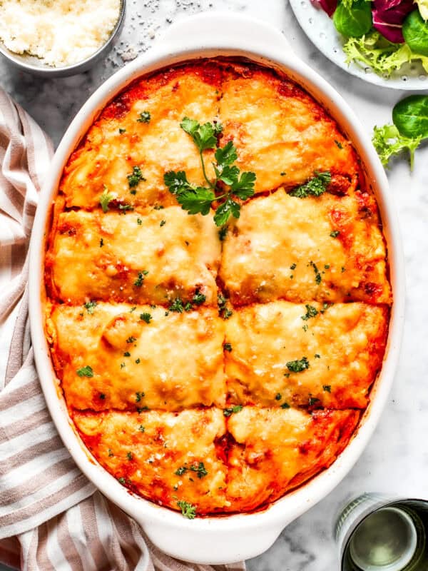 Overhead image of baked million dollar spaghetti in a casserole dish.