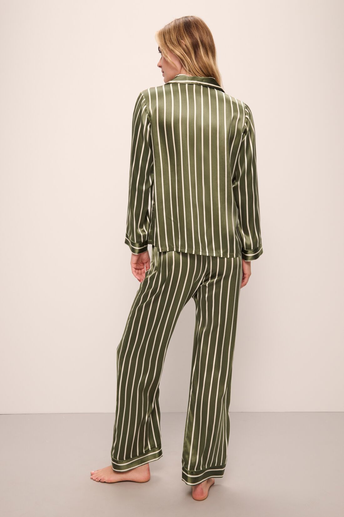 Model is wearing Inez Washable Silk Printed Long PJ Set in Classic Stripe Moss/Moss.