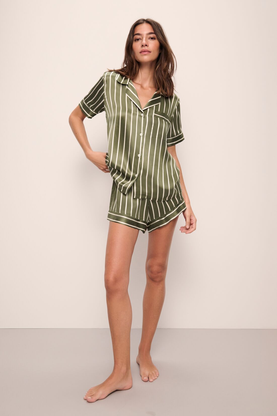 Model wears Inez Washable Silk Printed Short PJ Set in Classic Stripe Moss/Moss.