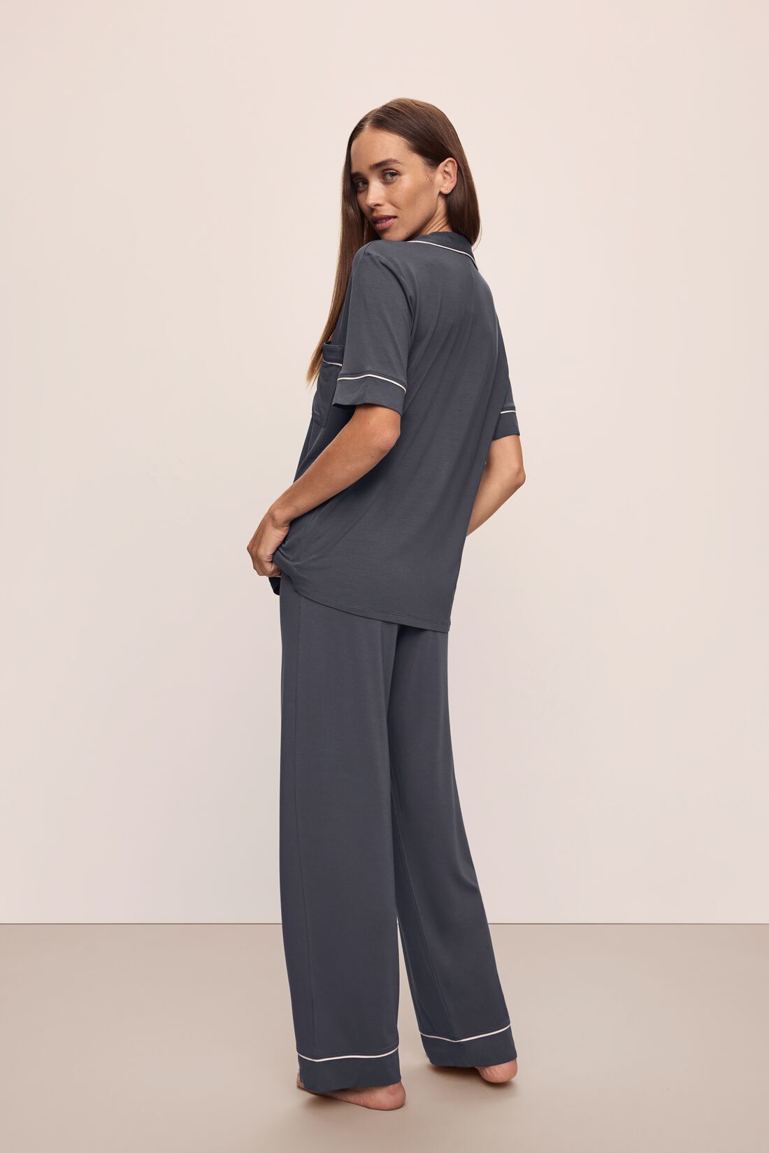 Model wears Gisele TENCEL™ Modal Short Sleeve & Pant PJ Set in Graphite/Sorbet Pink.