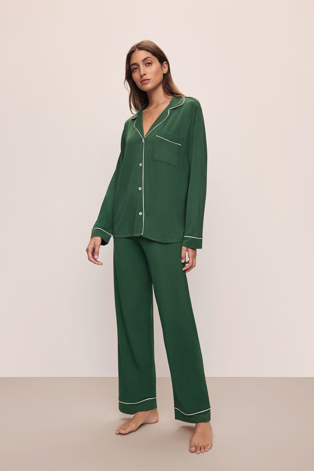 Model wears the Gisele TENCEL™ Modal Long PJ Set in Forest Green/Ivory.