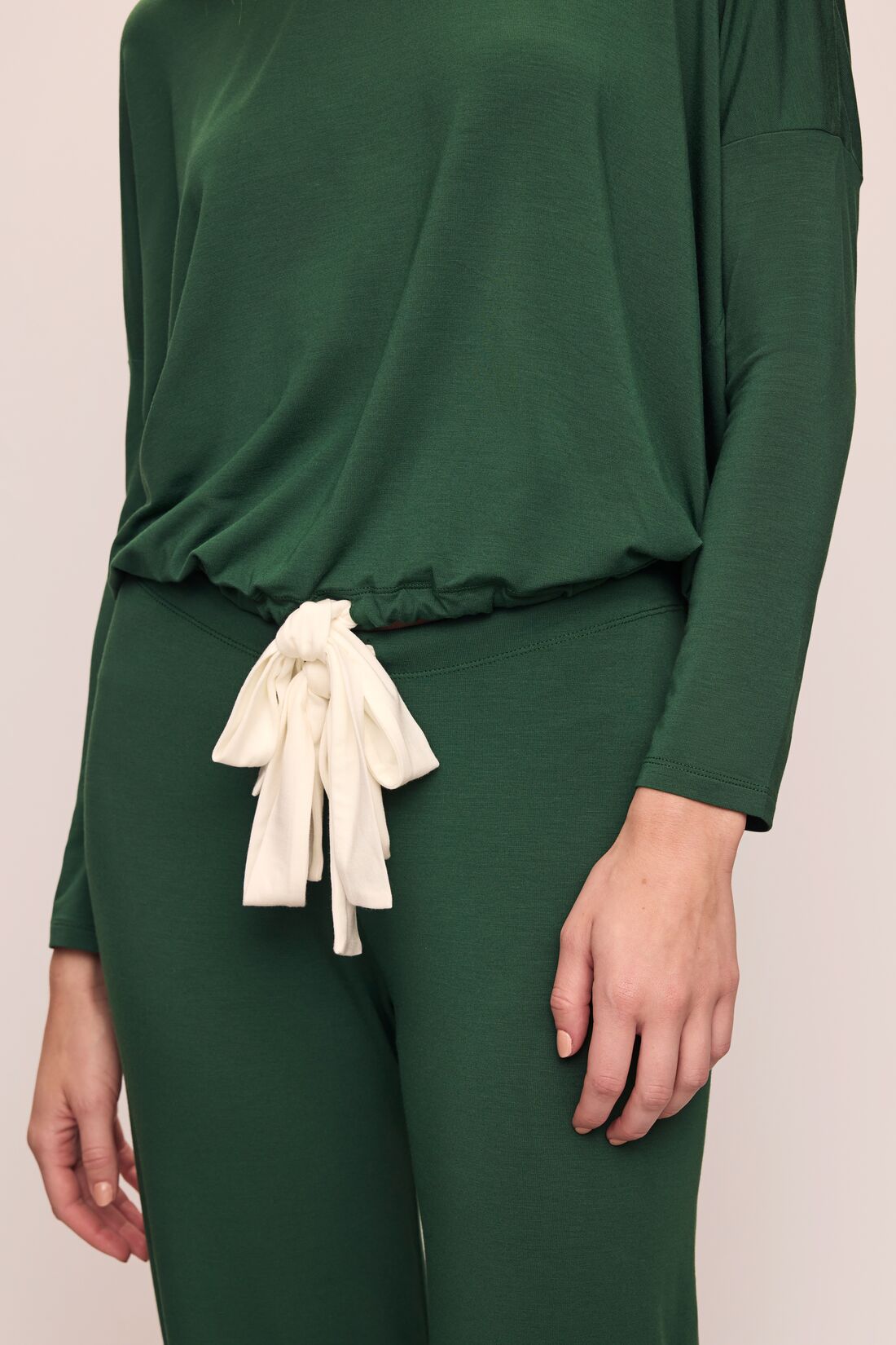 Model wears Gisele TENCEL™ Modal Slouchy PJ Set in Forest Green/Ivory.