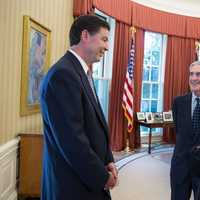 <p>President Barack Obama talks with James Comey, left, and FBI Director Robert Mueller in the Oval Office prior to announcing Comey&#x27;s nomination to succeed Robert Mueller as FBI director on Friday. </p>