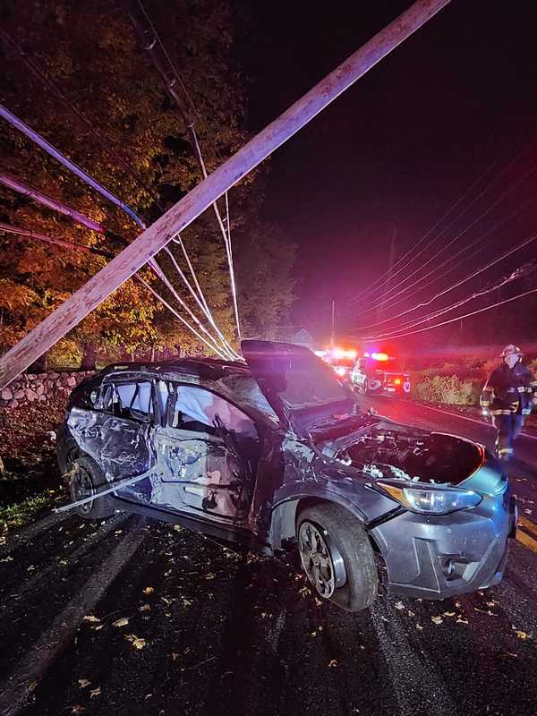 Driver Hospitalized After Car Snaps Poles In Westchester