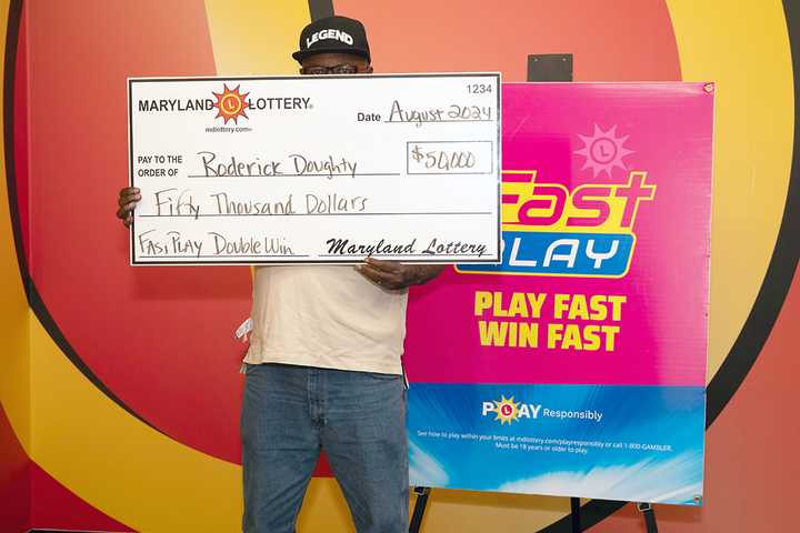 Grandfather Of Nine Wins $50K On Maryland Lottery Ticket After Hitting Wrong Button