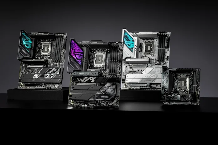 Four ASUS motherboards in a row on a table