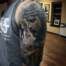 Perhaps you are thinking that it is a good tattoo to show off your religious beliefs. Religious Jesus Carrying Cross Tattoo Novocom Top