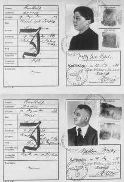 Passports issued to a German Jewish couple, with "J" for "Jude" stamped on the cards.