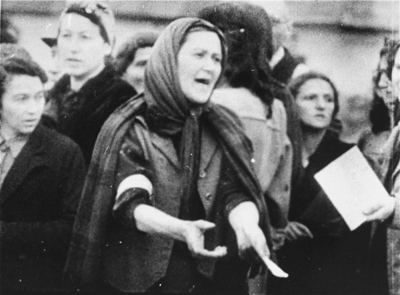 A Jewish woman during a deportation from the Warsaw ghetto.