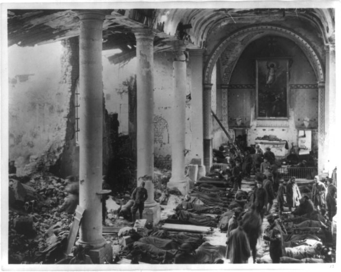 An American army field hospital inside the ruins of a church in France during World War I.