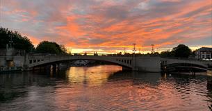 View of Caversham Bridge at sunset.