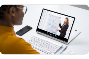 person watching a presentation on a laptop