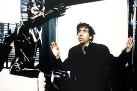 BATMAN RETURNS, from left, Michelle Pfeiffer, director Tim Burton, on-set, 1992