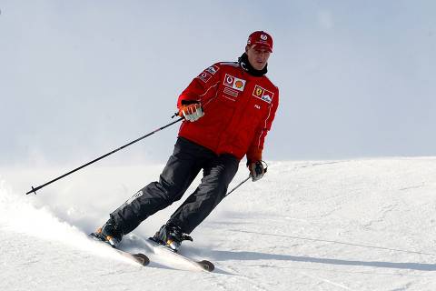 (FILES) picture taken on January 15, 2004 shows Ferrari Formula one driver world champion German Michael Schumacher skiing in Madonna di Campiglio, Italy. Former Formula One champion Michael Schumacher has left a Swiss hospital and will continue his treatment at home after a devastating ski accident in December, his family said in a statement on September 9, 2014.     AFP PHOTO/ Vincenzo PINTO ORG XMIT: VIP201