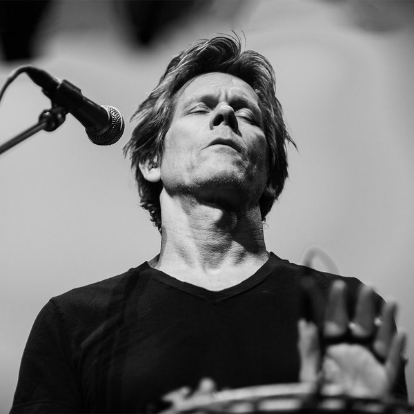 Kevin Bacon plays percussion