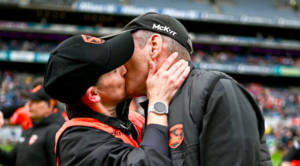 Armagh manager Kieran McGeeney kisses his wife Maura O'Rahilly after his side's victory in the GAA Football All-Ireland Senior Championship quarter-final match between Armagh and Roscommon at Croke Park in Dublin. 'Geezer' found out earlier in the day that he's uncle had passed away Photo by Harry Murphy/Sportsfile (Harry Murphy / SPORTSFILE/SPORTSFILE)