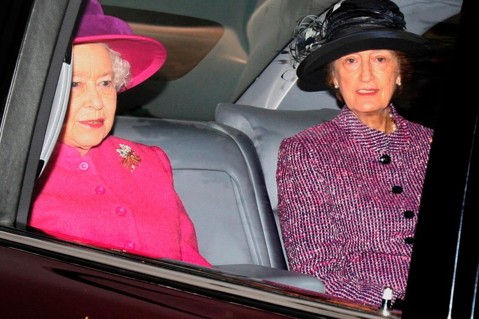 Queen Elizabeth II (left), and her then lady in waiting, Lady Susan Hussey