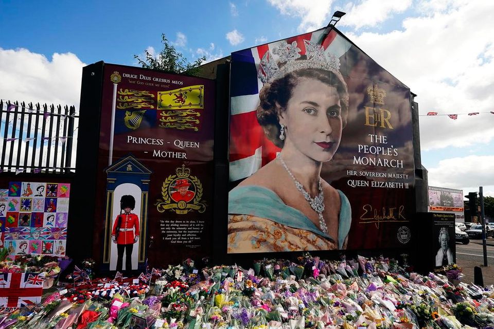 Flowers on Belfast’s Shankill Road following the death of Queen Elizabeth II in September (Credit: Brian Lawless/PA)