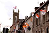 thumbnail: Armagh GAA flags and A union flag in Poyntzpass (Picture by Peter Morrison)