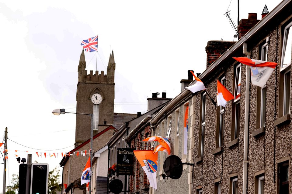 Armagh GAA flags and A union flag in Poyntzpass (Picture by Peter Morrison)