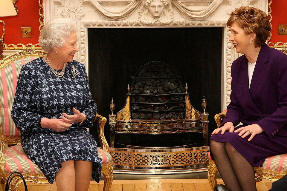 Queen Elizabeth II talks with Irish President Mary McAleese at Hillsborough Castle, 2005, the first time that the Queen has held a meeting with the Irish President on the island of Ireland