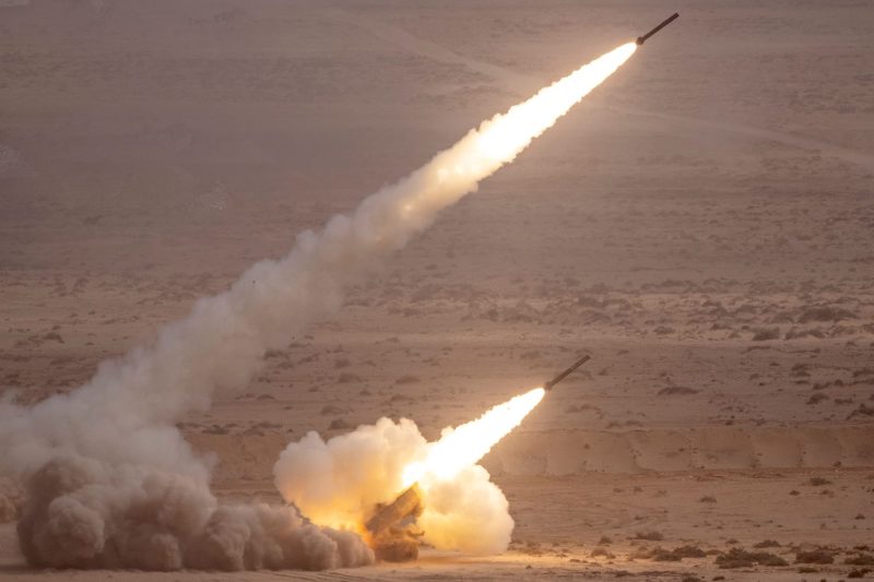 A U.S. High Mobility Artillery Rocket System (HIMARS) fires during a military exercise.