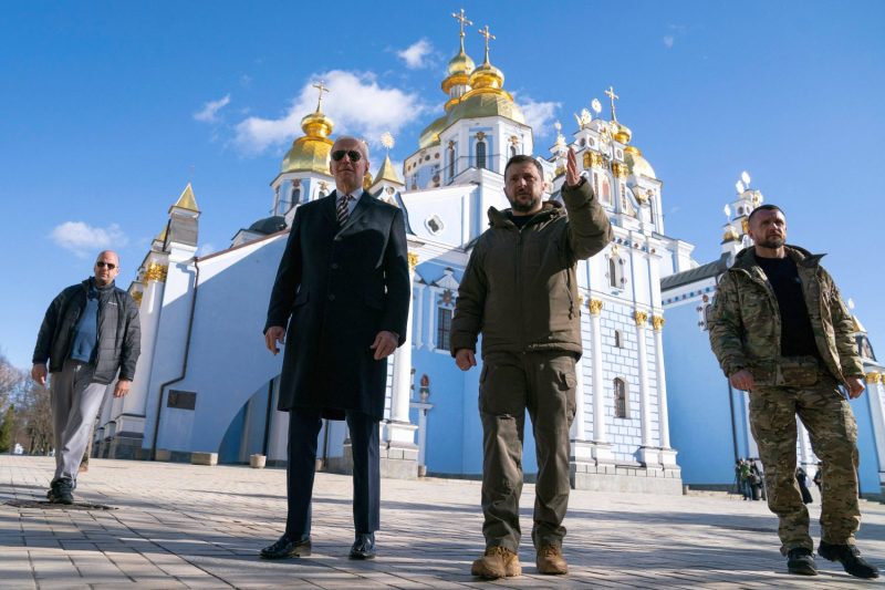 U.S. President Joe Biden (left) and Ukrainian President Volodymyr Zelensky walk in front of St. Michael's Golden-Domed Cathedral in Kyiv.